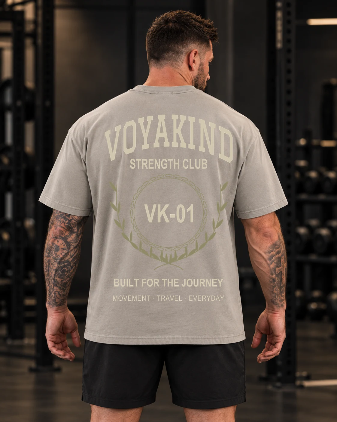 Strength Club artwork on a Dust tee; digital back-view mockup